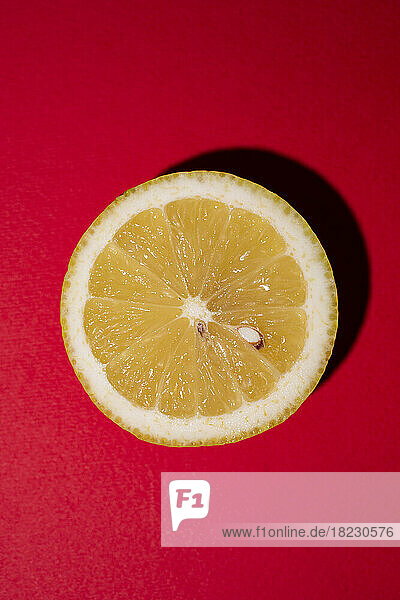 Studio shot of halved lemon