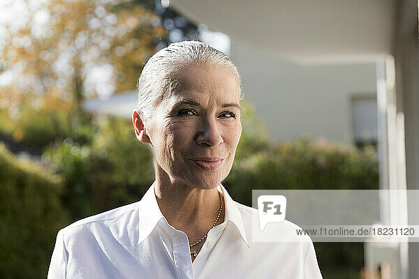 Confident senior woman with gray hair