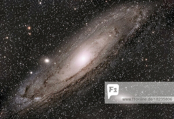 Andromeda galaxy surrounded by stars in sky