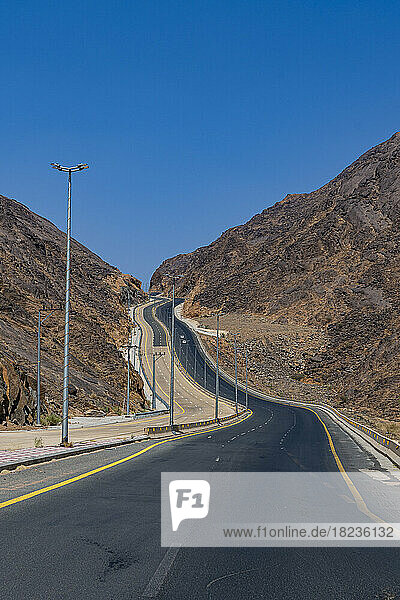 Saudi Arabia  Najran Province  Najran  Asphalt road in rocky mountains
