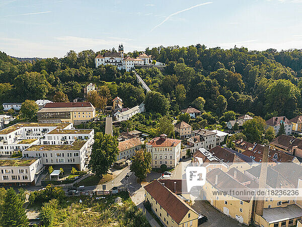 Germany  Bavaria  Passau  Aerial view of modern luxury hotel on edge of historic old town with Paulinerkloster in background