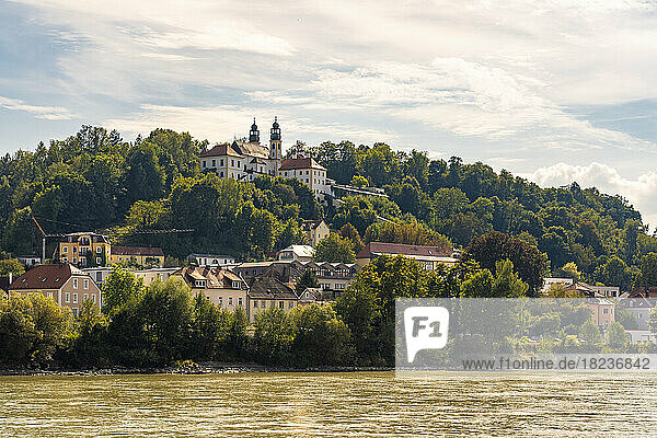 Germany  Bavaria  Passau  Inn River in summer with Wallfahrtskirche Mariahilf church in background
