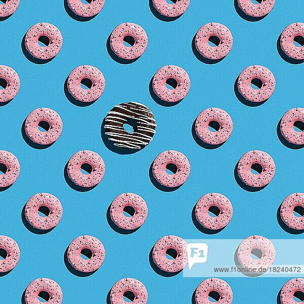 Süße Donuts Muster auf einem blauen Hintergrund
