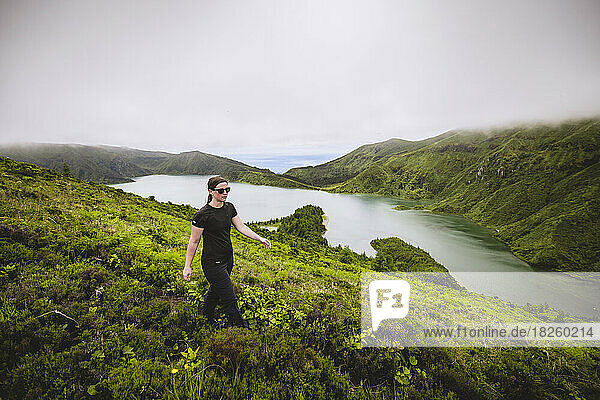 one woman walks on hiking trail near Lagoa do Fogo  Azores