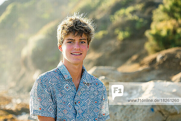 Portrait Of A California Boy At The Beach At Golden Hour