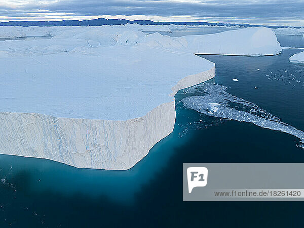 detail of extreme icebergs from aerial view