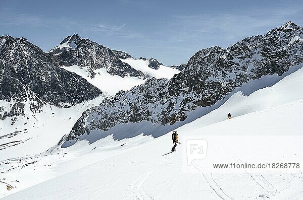 Splitboarders on the descent  mountains in winter  Stubai Alps  Tyrol  Austria  Europe