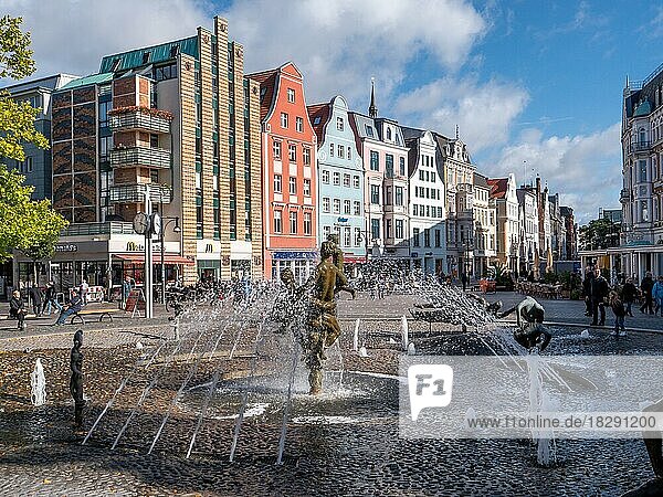 Fountain of joie de vivre  built in 1980 in the Kröpeliner Strasse in the city centre in front of colourful and old buildings in the Kröpeliner Strasse in the city centre  Rostock  Hanseatic City of Rostock  Baltic Sea  Mecklenburg-Western Pomerania  Eastern Germany  Germany  Europe
