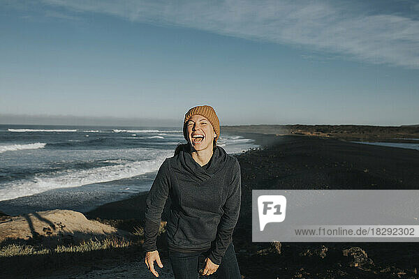 Happy woman enjoying at volcanic beach  Janubio Beach  Lanzarote  Canary Islands  Spain