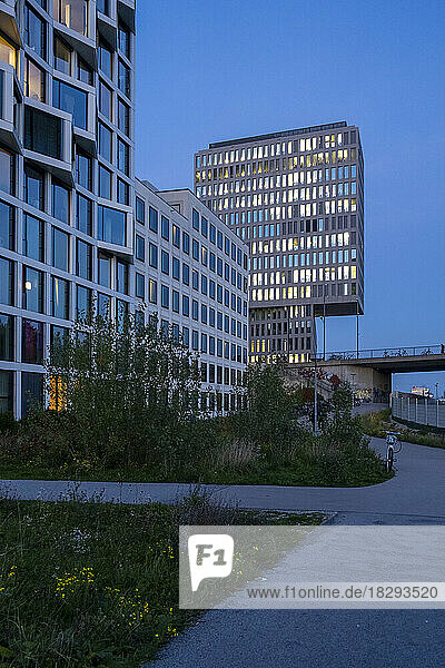 Germany  Bavaria  Munich  Modern office buildings at dusk