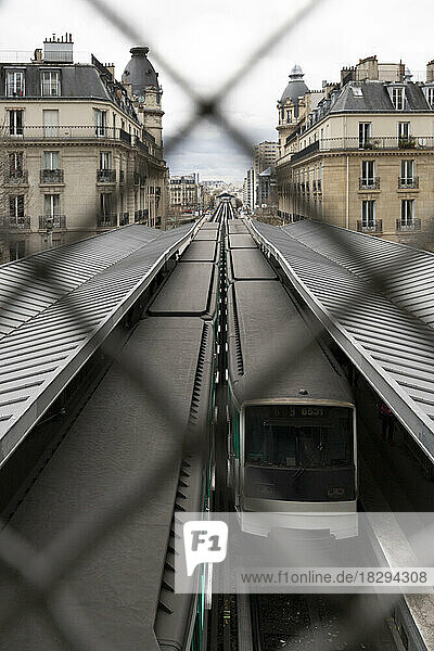 France  Ile-de-France  Paris  Subway platform seen through chainlink fence
