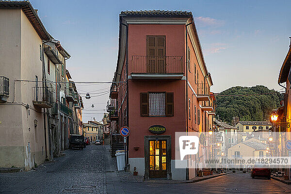 Italy  Lazio  Capodimonte  Restaurant between two alleys at dusk