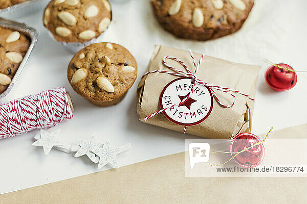 Traditional Dundee cakes and wrapped Christmas present