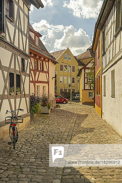 Germany  Bavaria  Forchheim  Half-timbered houses along cobblestone alley in Rosengasschen yawn