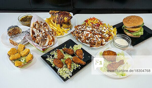 Kebab restaurant chef  traditional turkish and arabic food  multiple dishes  background  turkish food