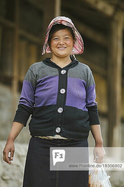 Laughing Tibetan woman with cap  Langmusi  Gansu Province  China  Asia