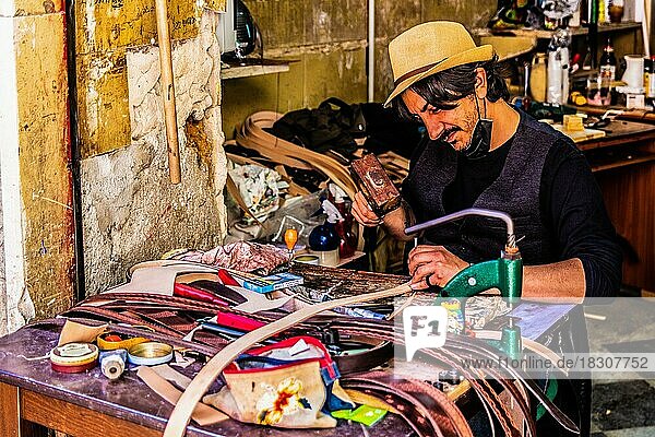 Belt makers  Ballarò market  the most famous and ancient market of Palermo with oriental charm  Sicily  Palermo  Sicily  Italy  Europe