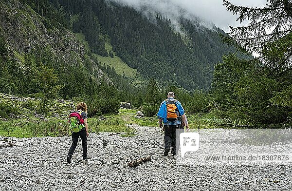 Hikers in the Tyrolean mountains  Vilsalpsee  Tyrol  Austria  Europe