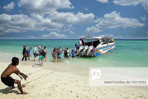 Tourists return to Krabi by moto boat after a day trip from Ko Poda Beach  Thailand  Asia