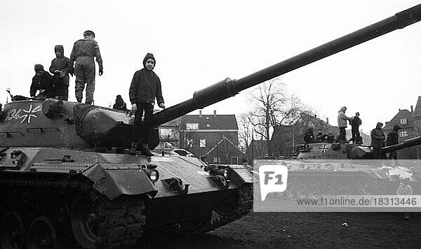 The Bundeswehr weapons show  here in Dortmund-Lüttgendortmund in 1966  attracted the interest of children and young people Opponents of war protested against di Opponents of war protested against the show  Germany  Europe