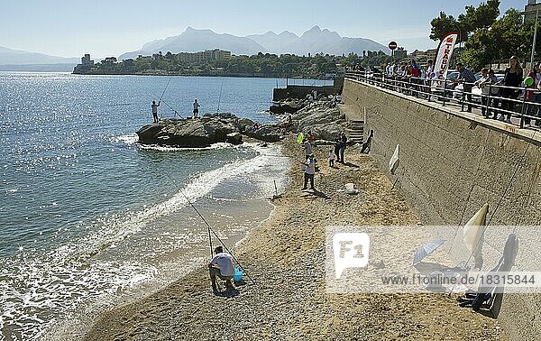 Anglers on the beach of Porticello  Palermo region  Sicily  Italy  Europe