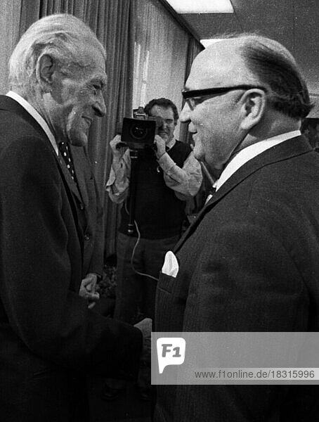 The senior member of the Communist Party of Germany (KPD/ DKP) Max Reimann celebrated his 75th birthday in Düsseldorf on 31 October 1973. As a member of the Parliamentary Council  he was involved in the drafting of the Basic Law  which he refused to approve. Max Reimann on the left with Arno Behrisch (DFU) formerly SPD  Germany  Europe