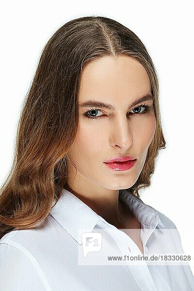 Closeup portrait of fashion model with natural makeup  blue eyes and red lips