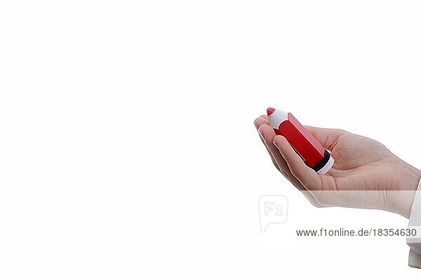 Isolierter dicker  roter Bleistift in der Hand auf weißem Hintergrund