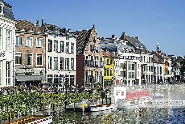 Restaurants and sightseeing boats along the Kraanlei  Crane Lane in the city Ghent  Gent  East Flanders  Belgium  Europe