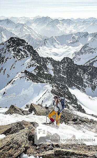 Mountaineer at the summit of the Sulzkogel  mountains in winter  Sellraintal  Kühtai  Tyrol  Austria  Europe