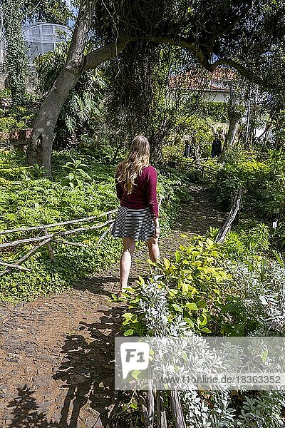 Young woman on a path  Funchal Botanical Garden  Jardim Botanico  Madeira  Portugal  Europe
