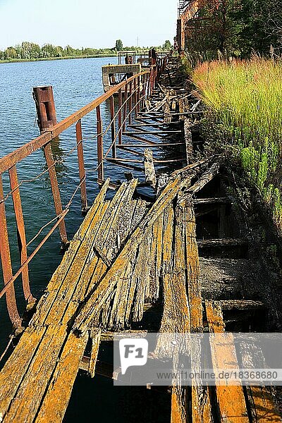 Exclusion zone  Lost place  Pripyat  in the uninhabitable 30-kilometre zone around the Chernobyl power plant and the workers' settlement of Pripyat  footbridge to the crane at the jetty  cemetery of the cranes of the Dnepr River  Ukraine  Europe