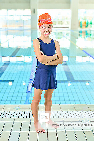 Kid at indoor swimming pool