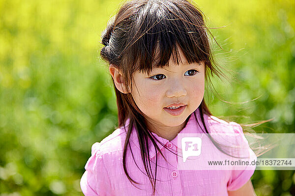 Japanese kid portrait in a city park