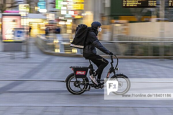 Bicycle courier of the delivery service Gorillas  Rider  Stuttgart  Baden-Württemberg  Germany  Europe