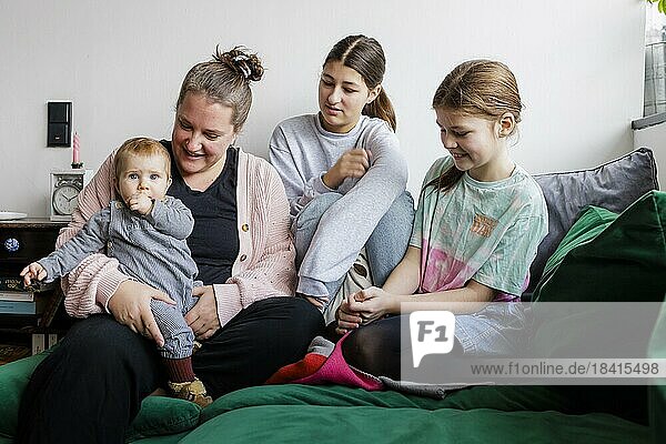 Woman with three daughters  Bonn  Germany  Europe