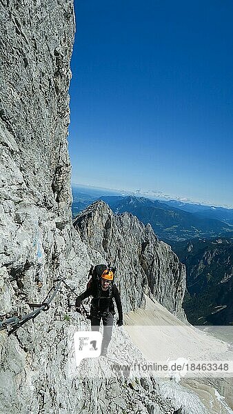 Passage via ferrata with a large exposure and an amazing view of the mountain range and the glacier. Zugspitze massif  Bavarian Alps  Bavarian Alps  Germany  Europe
