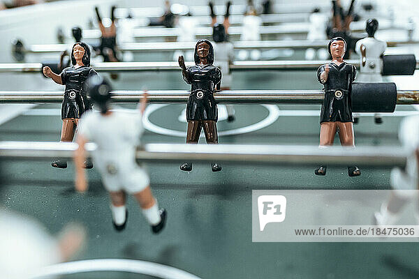 Foosball table with figurine at office