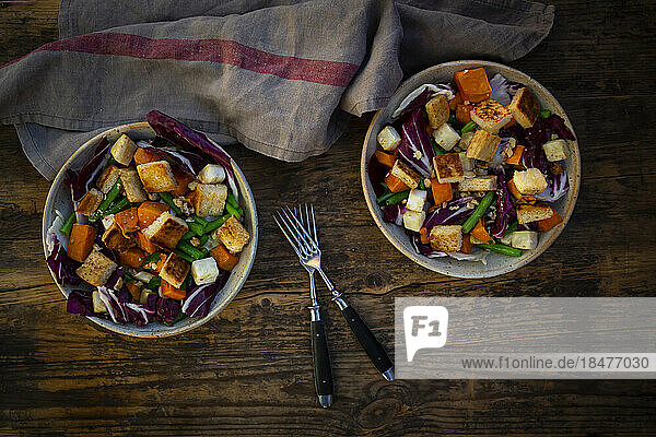 Two bowls of ready-to-eat vegan salad