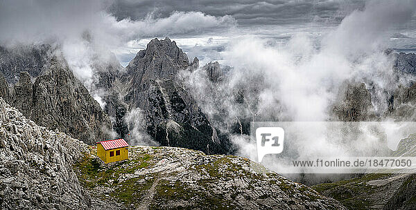Scenic view of mountains under cloudy sky at Bivacco Milnazio  Dolomites  Italy