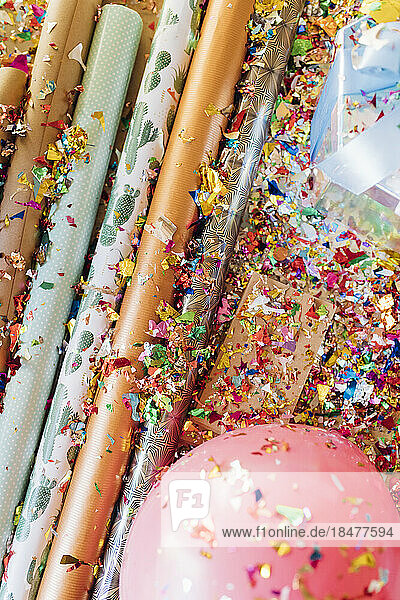 Wrapping paper with confetti and balloons