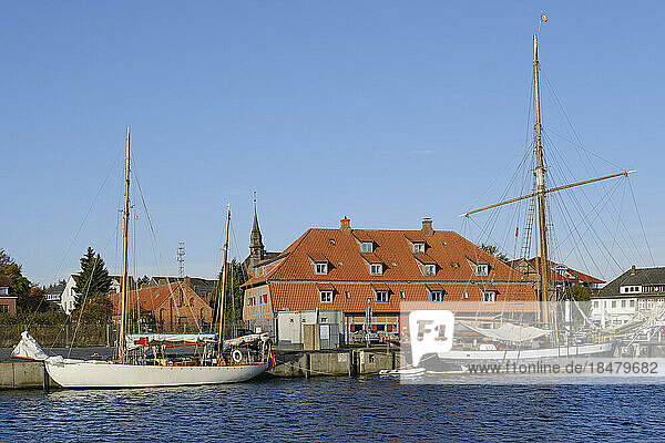 Germany  Schleswig-Holstein  Neustadt in Holstein  Sailing ships moored in front of old granary