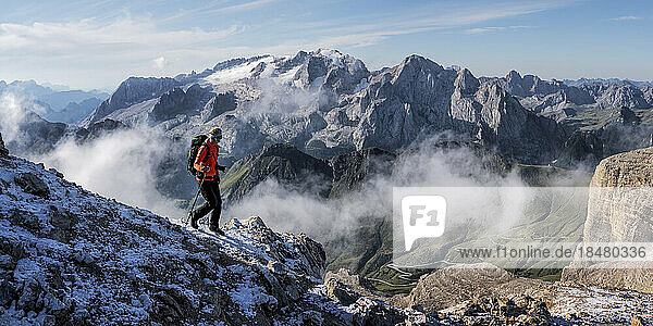 Senior woman hiking at Piz Boe  Dolomites  Italy