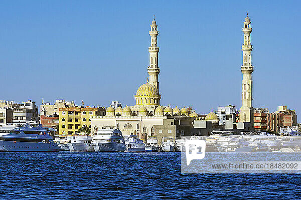 Egypt  Red Sea Governorate  Hurghada  Boats moored in front of El Mina Mosque