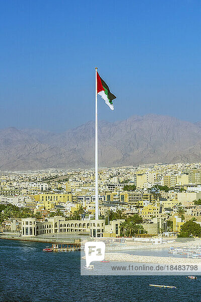 Jordanian Flag at Aqaba seaport on sunny day