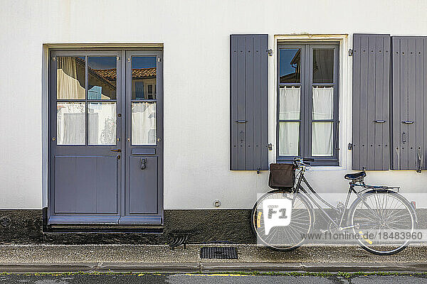 France  Nouvelle-Aquitaine  Ars-en-Re  Bicycle left in front of house