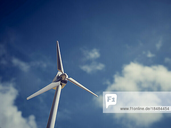 Wind turbine model in front of sky