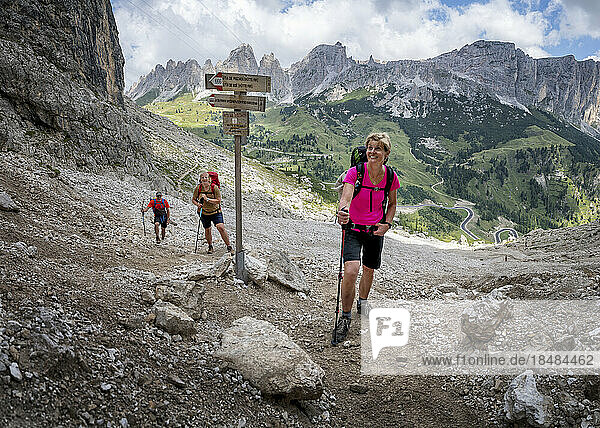 Senior woman with friends standing at Dolomites  Italy