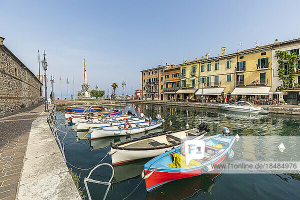 Italy  Veneto  Lazise  Boats moored on shore of Lake Garda