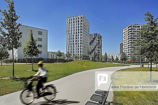 New development with cyclist  Hofmann Höfe  Obersendling  Munich  Bavaria  Germany  Europe